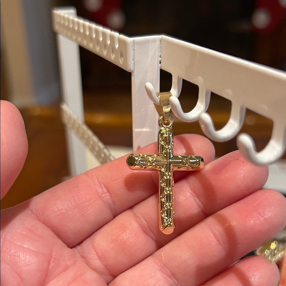 Elegant Gold Cross Brooch
